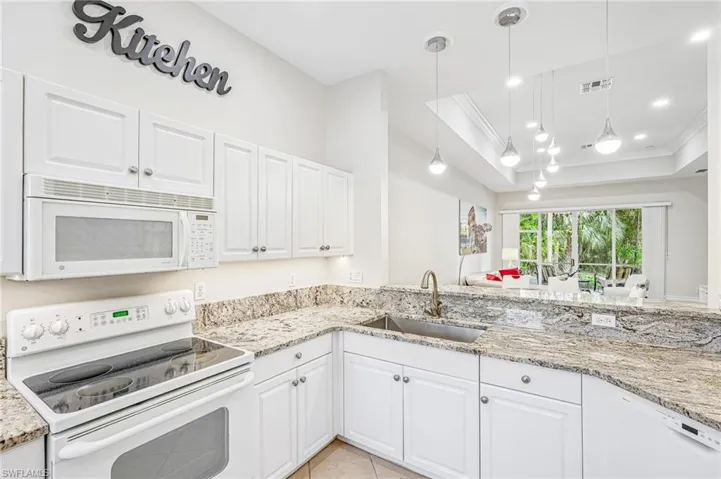 Spacious Kitchen with Generous Cabinet Space & A Pantry