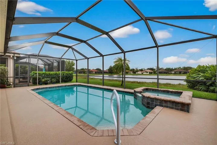 Pool and spa with lake view