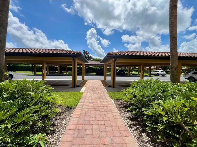 View of home's community featuring a gazebo and covered parking