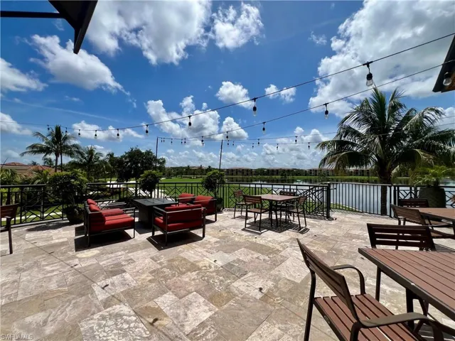 View of patio with outdoor dining space and an outdoor hangout area