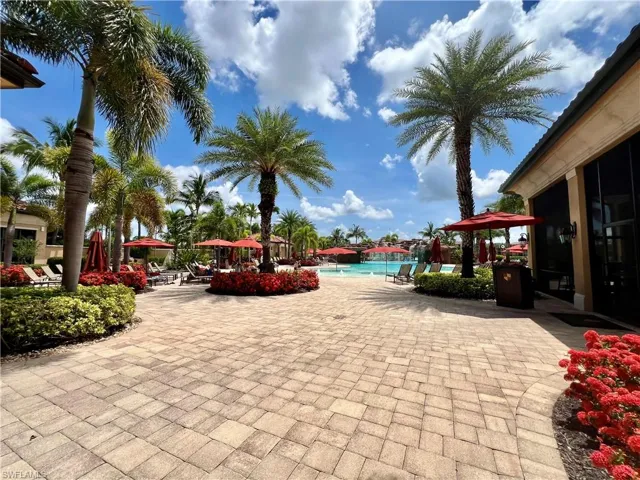Community pool featuring a patio