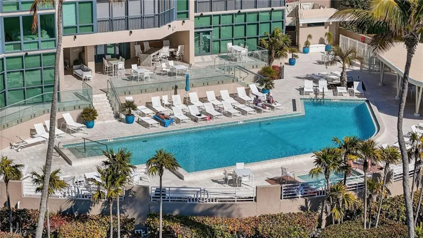 Community pool featuring a patio