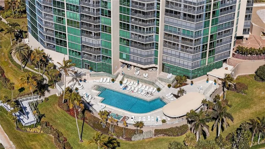 Aerial view of a pool and apartment complex