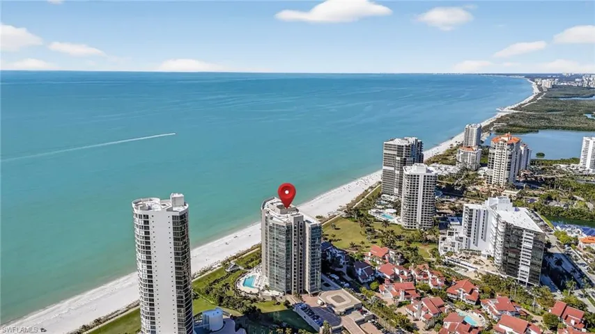View of urban area featuring expansive beach