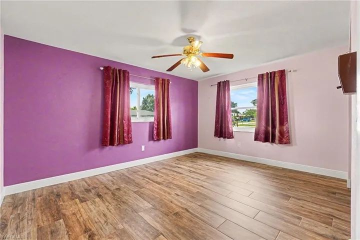 The larger bedroom is 14' x 12' with more of that beautiful tile