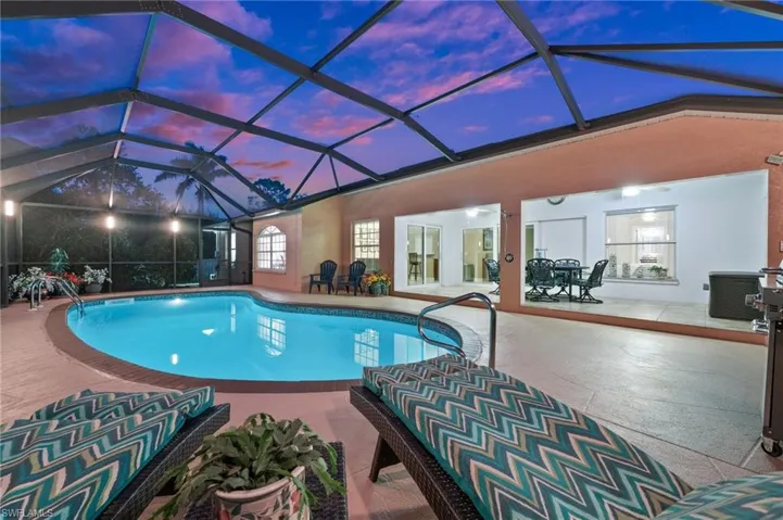 Spacious lanai with accent lighting & covered area.