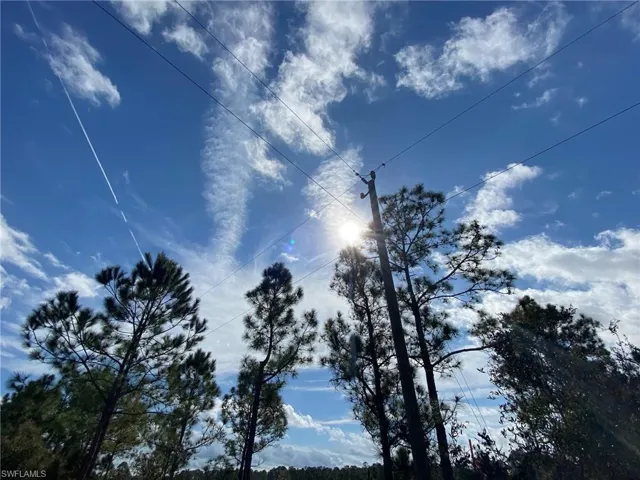 POWER LINES ADJACENT TO ENTIRE 40 ACRES & ACCESS ROAD