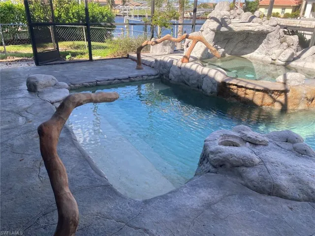 Pool and Hot Tub offer multiple seating, special lighting and build-in planters