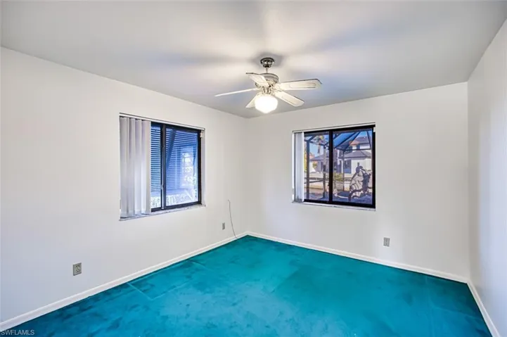 The  3rd ground floor Bedrooms with walk-in closet and ceiling fan