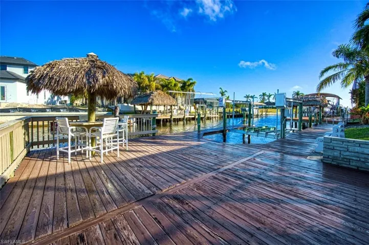 Extended dock with railing and 10,000# Boatlift