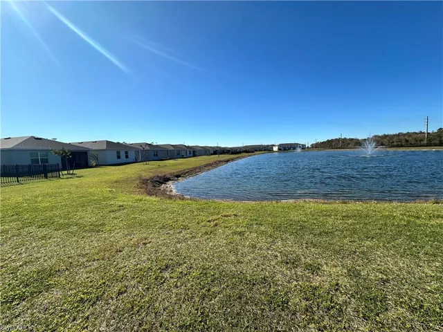 Water view featuring nearby suburban area