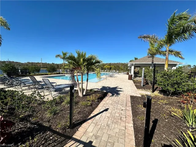 Community pool with a patio and a gazebo