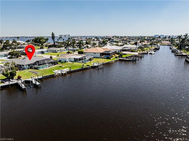 Aerial view of residential area with a nearby body of water