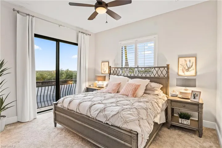 Guest bedroom @ 2 - this is a junior master with its own full bathroom and private balcony.  This home is sold turn key and everything you see remains with the home!