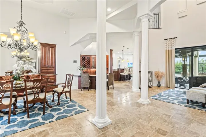 Living room, dining, bar and kitchen - there is also a dining nook in the kitchen and a soaring two story cathedral ceiling in the living area!