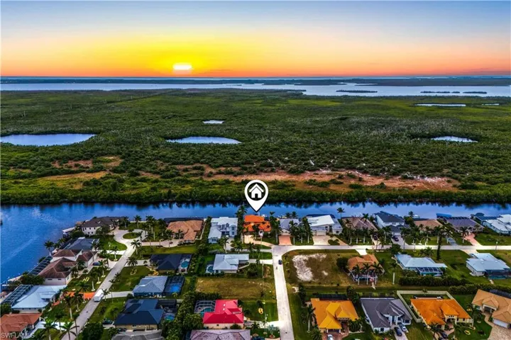 Aerial view at dusk with a water view