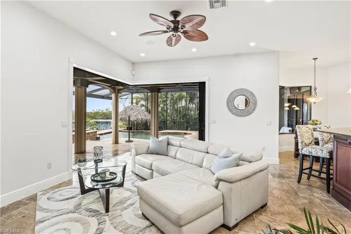 Double 90 degree disappearing sliders blend the indoor and outdoor areas to create the perfect SWFL lifestyle - live your best life and enjoy those beautiful views!