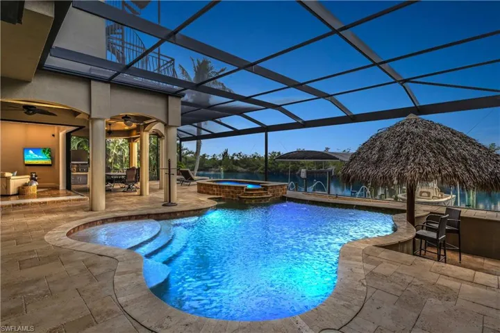 This pool!!  These views!  Pure paradise and all set on a picture perfect lot with million dollar views!  Built for someone who loves the water and enjoys the SWFL lifestyle!