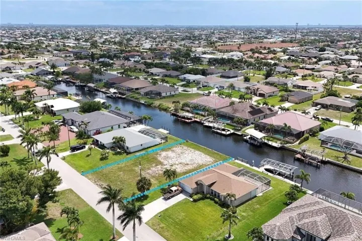 Aerial view of residential area with a large body of water