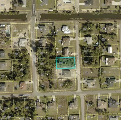 Aerial view of property's location featuring property parcel outlined