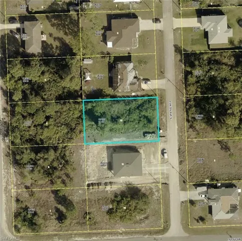 Aerial overview of property's location featuring property parcel outlined