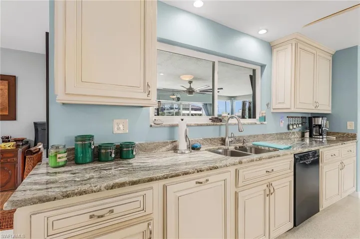 Stunning solid wood cabinets with granite counter tops.