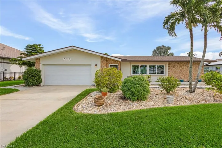 Stunning four bedroom home in a very exclusive and quiet neighborhood.