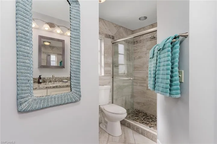 Beautifully updated master bathrood with walk in closet.