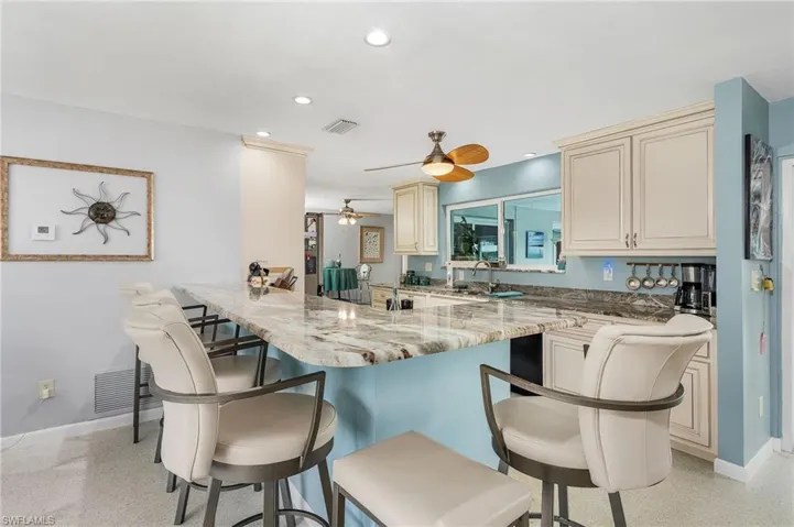 Ample seating around the kitchen island.