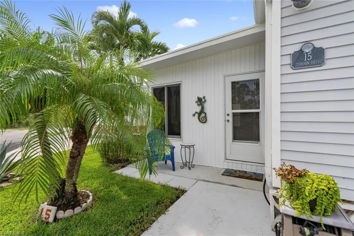 Property entrance featuring a patio area