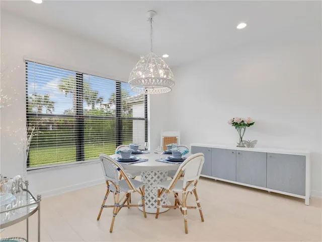 Spacious Dining Area with Custom Lighting