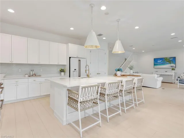 Open Floorplan to Living & Dining Areas