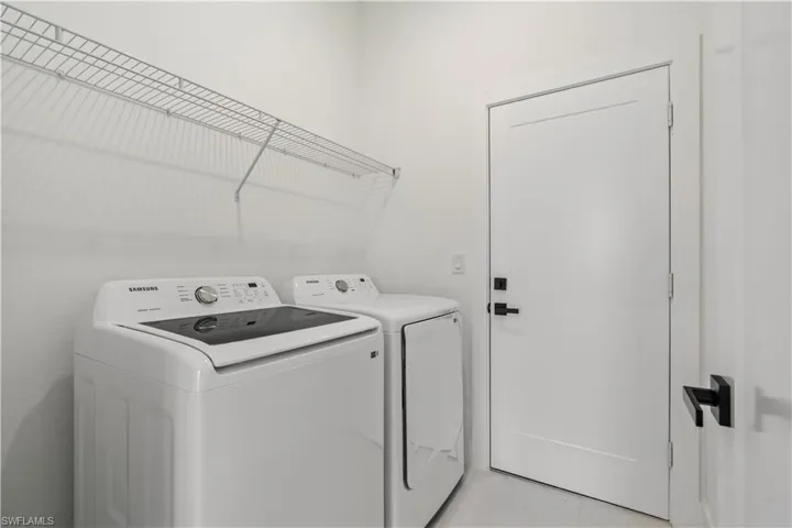 Washroom with separate washer and dryer