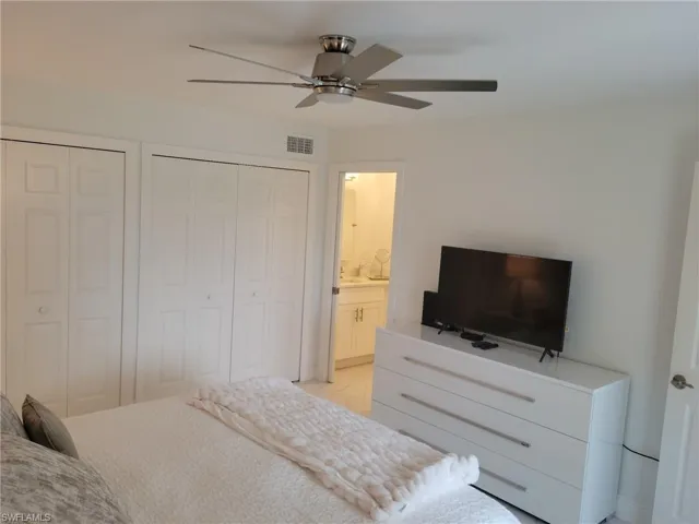 Owner's Suite with full bath, 2 closets, TV, lighted ceiling fan.