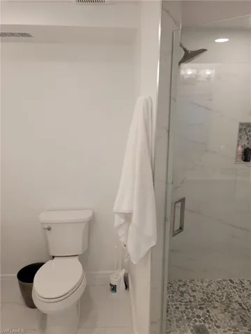 Master bath with tiled shower.