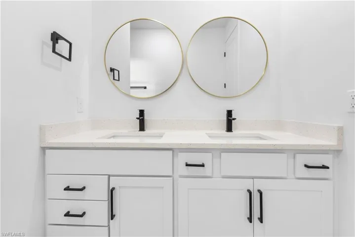 Bathroom featuring double vanity