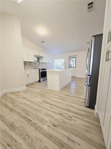627  Delmonico  ST, LEHIGH ACRES, FL 33974