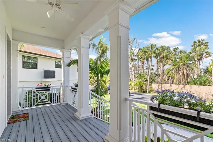 Wooden terrace with ceiling fan