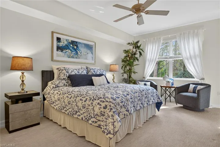 King bed, sliders to lanai, en suite bath