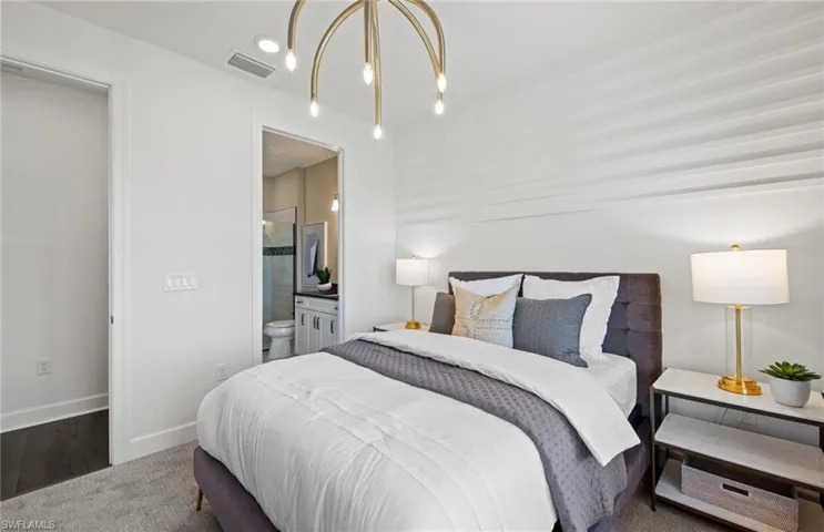 Interior photos are of a staged model home. Illustration purposes only. Options may vary. 1st floor bedrom with en suite bath.