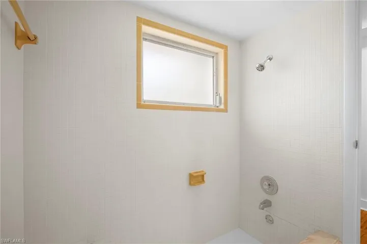 Bathroom featuring bathing tub / shower combination