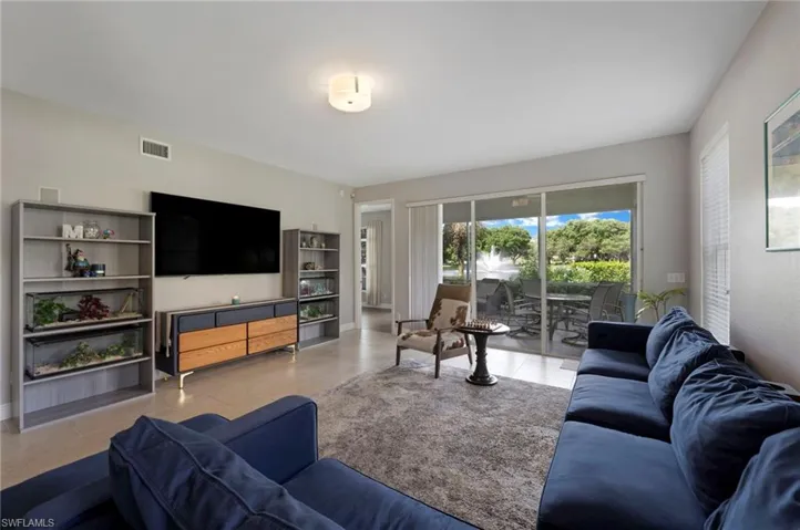 Living room with tile floors