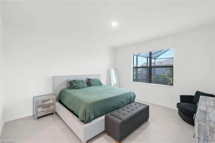 Bedroom featuring baseboards
