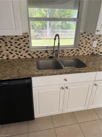 1237  Chrysler  ST, Lehigh Acres, FL 33974