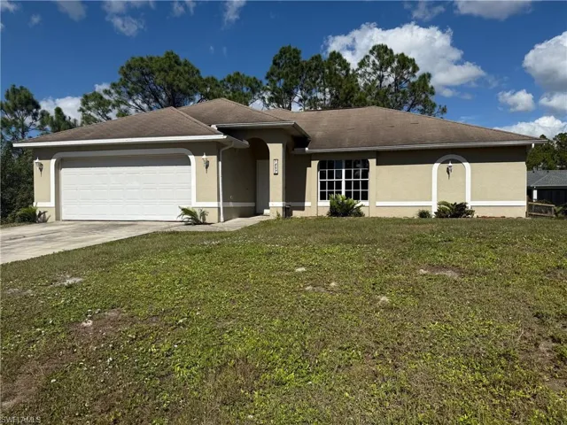1237  Chrysler  ST, Lehigh Acres, FL 33974