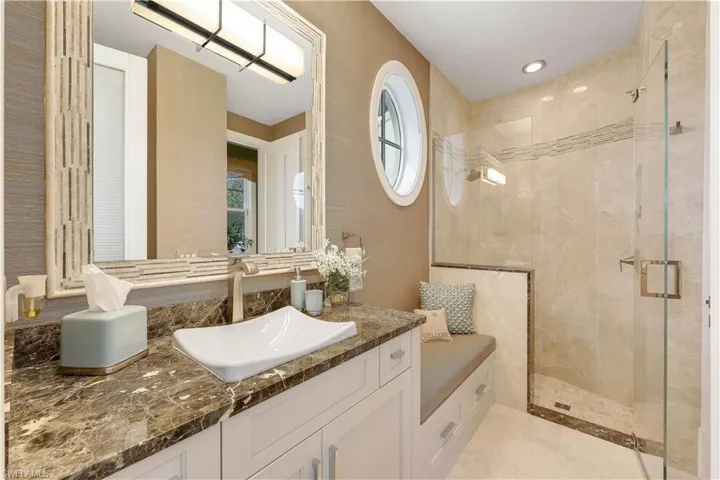 Full bathroom with pool/lanai access.