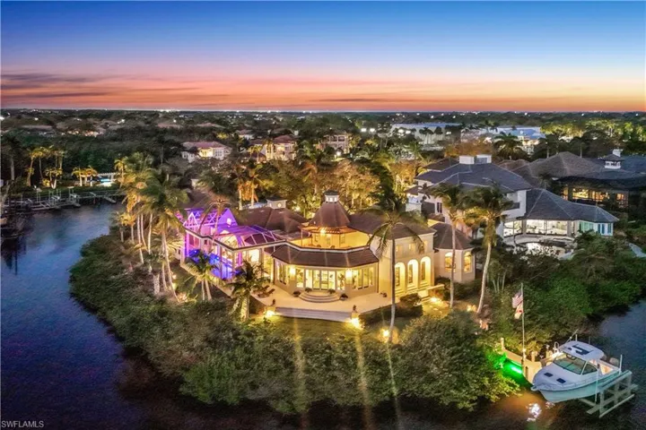 Aerial view of home just after the sun sets.