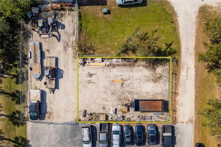 Private additional Parking 50x75. Drone / aerial view with a water view