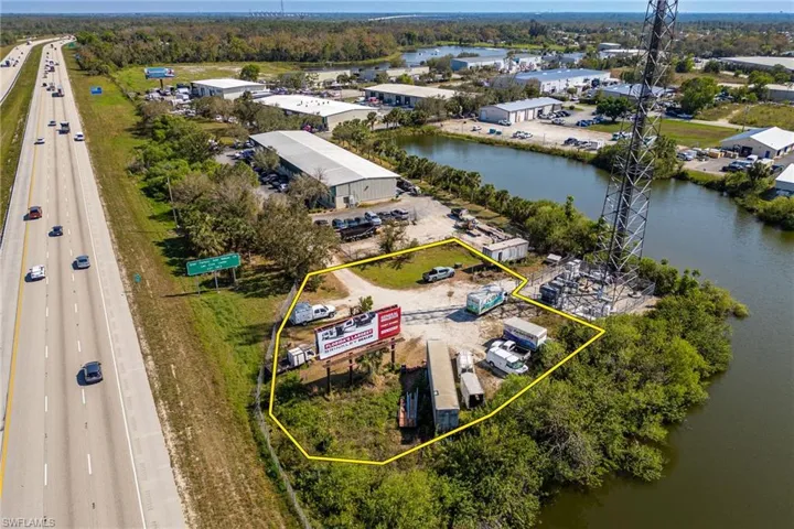 Community Parking, Drone / aerial view with a water view