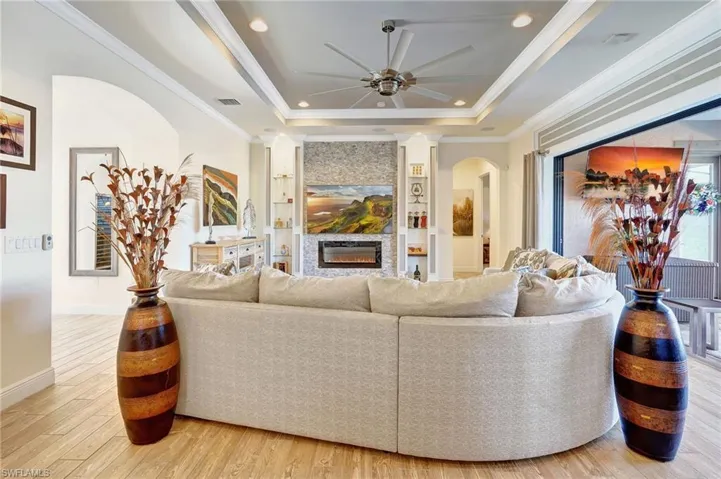 with coffered ceilings, crown molding and designer paint